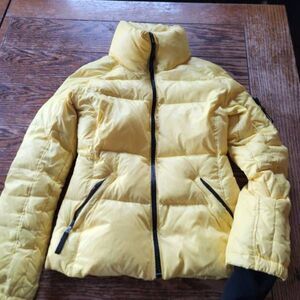 Sam.  Yellow puffer coat sz Small